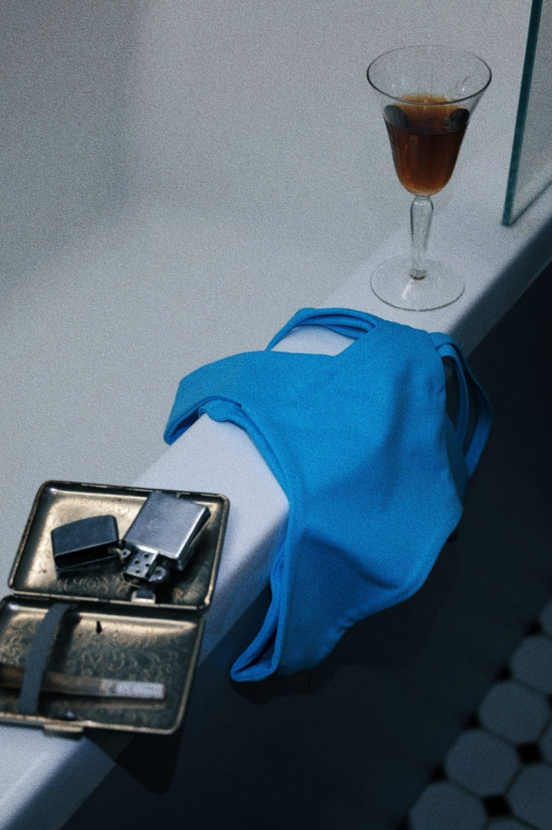 blue pole dance shorts flatlay