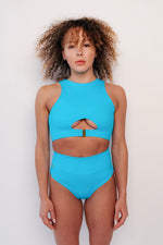 Pole wear two piece blue keyhole top with high waist shorts pole fitness